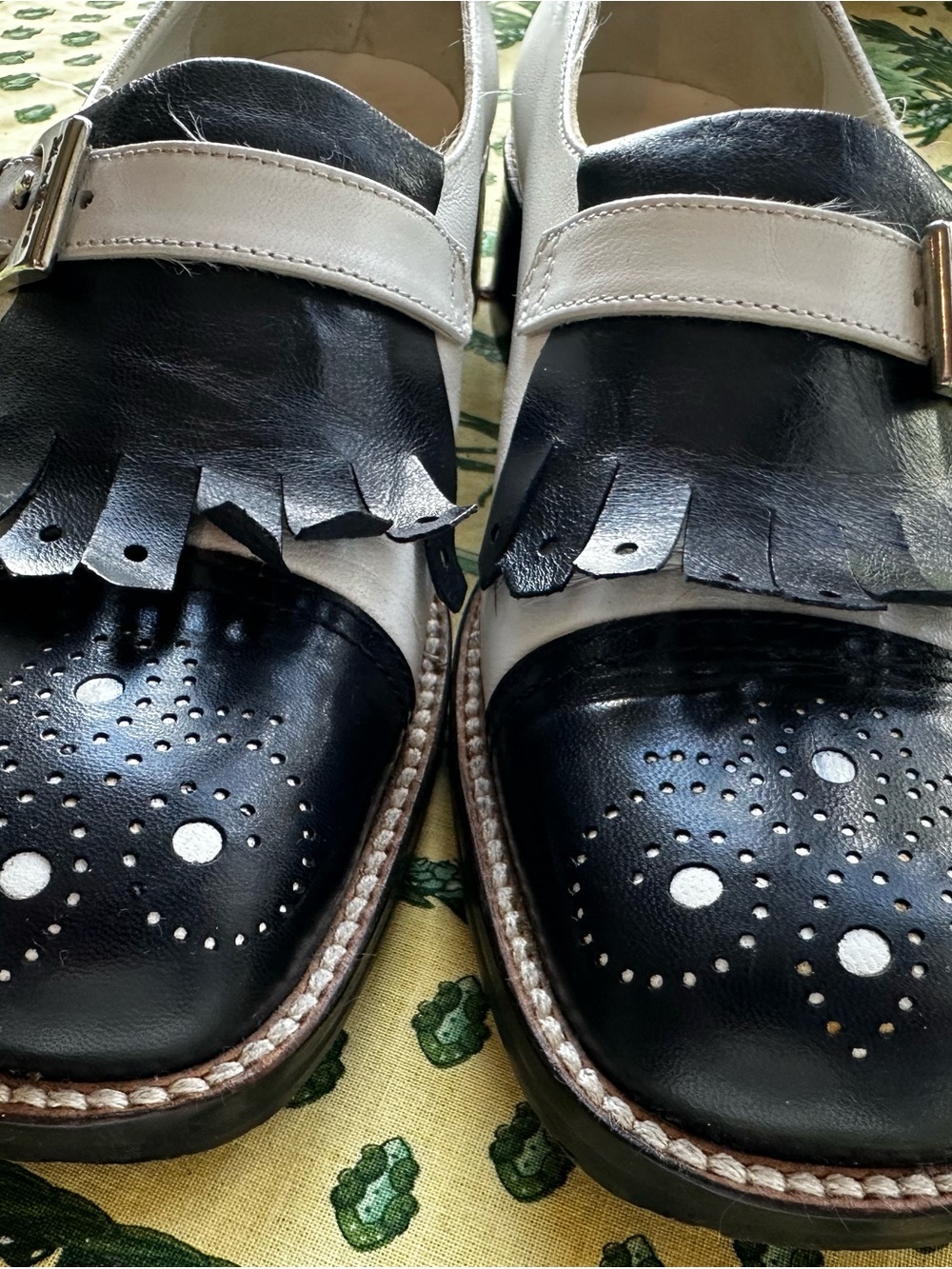 Vintage (late 90s ish) Max Mara low healed loafers with fringe detail.